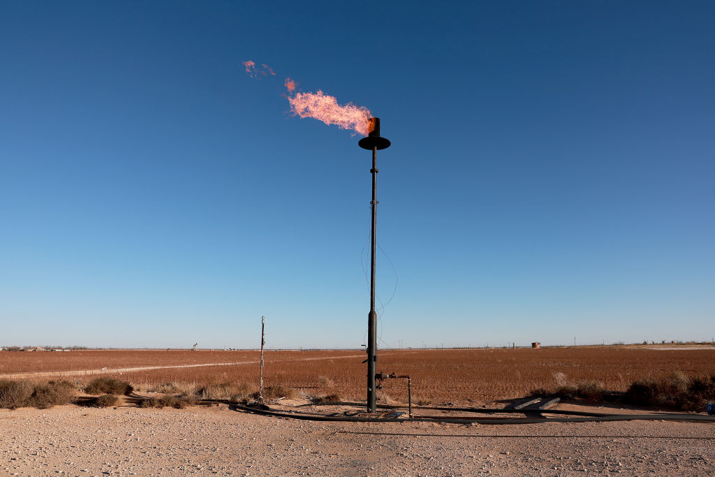 STANTON, TEXAS - MARCH 12: Natural gas is flared off during an oil drilling operation in the Permian Basin oil field on March 12, 2022 in Stanton, Texas. United States President Joe Biden imposed a ban on Russian oil, the world’s third-largest oil producer, which may mean that oil producers in the Permian Basin will need to pump more oil to meet demand. The Permian Basin is the largest petroleum-producing basin in the United States (Photo by Joe Raedle/Getty Images)