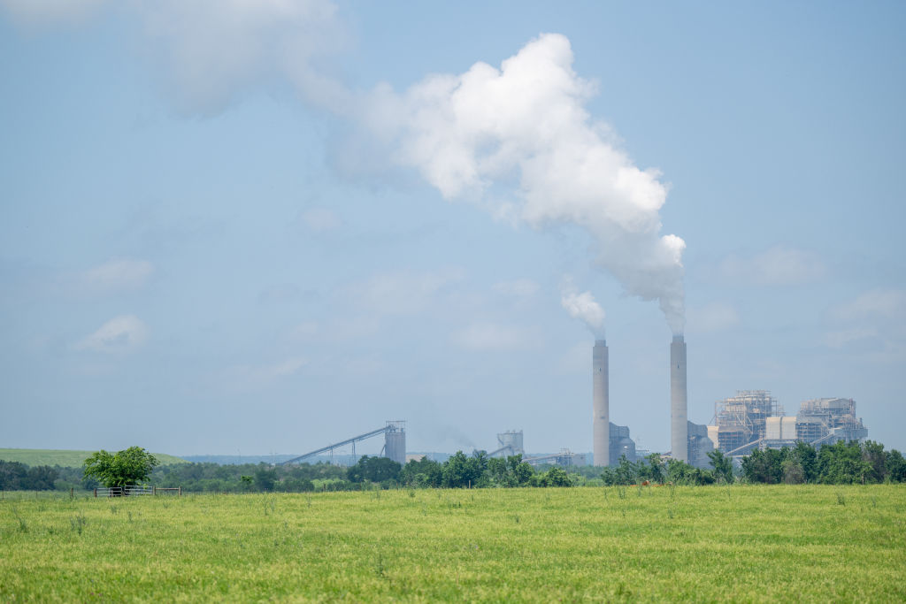 ROBERTSON COUNTY, TEXAS - APRIL 29: Emissions fume at the coal-fueled Oak Grove Power Plant on April 29, 2024 in Robertson County, Texas. In conjunction with the Biden-Harris Administration's attempt to curve climate change, the EPA (Environmental Protection Agency) has finalized four new rules which seek to reduce carbon emissions and mercury pollution amongst businesses and communities. Environmental regulators favor the decision, believing that the rules provide clear instruction and time allotment for power companies to begin finding solutions in providing reliable power while reducing harmful emissions. Industry groups have pushed back, stating that the change is coming at a time when more gas-fueled power is paramount. (Photo by Brandon Bell/Getty Images)